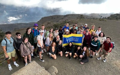 CIS students introduce youth to computer science while on study abroad