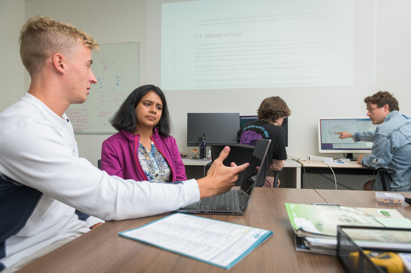 Computer and Information Sciences Associate Professor and David L. Mills and Beverly J.C. Mills Career Development Chair, Sunita Chandrasekaran and her research group of graduate and undergraduate students.